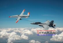 Un dron reabastece de combustible un “Super Avispón” Militar de EE.UU. en vuelo