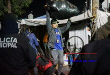 Migrantes desalojados de Tijuana.