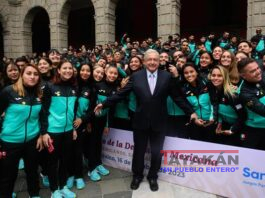 Mexican President Andres Manuel Lopez Obrador with athletes from Mexico.