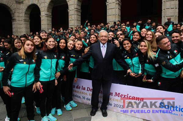 Mexican President Andres Manuel Lopez Obrador with athletes from Mexico.
